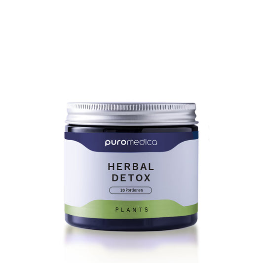 Das Bild zeigt einen eleganten, runden Behälter von Puromedica mit der Aufschrift „HERBAL DETOX“ auf dem Etikett.